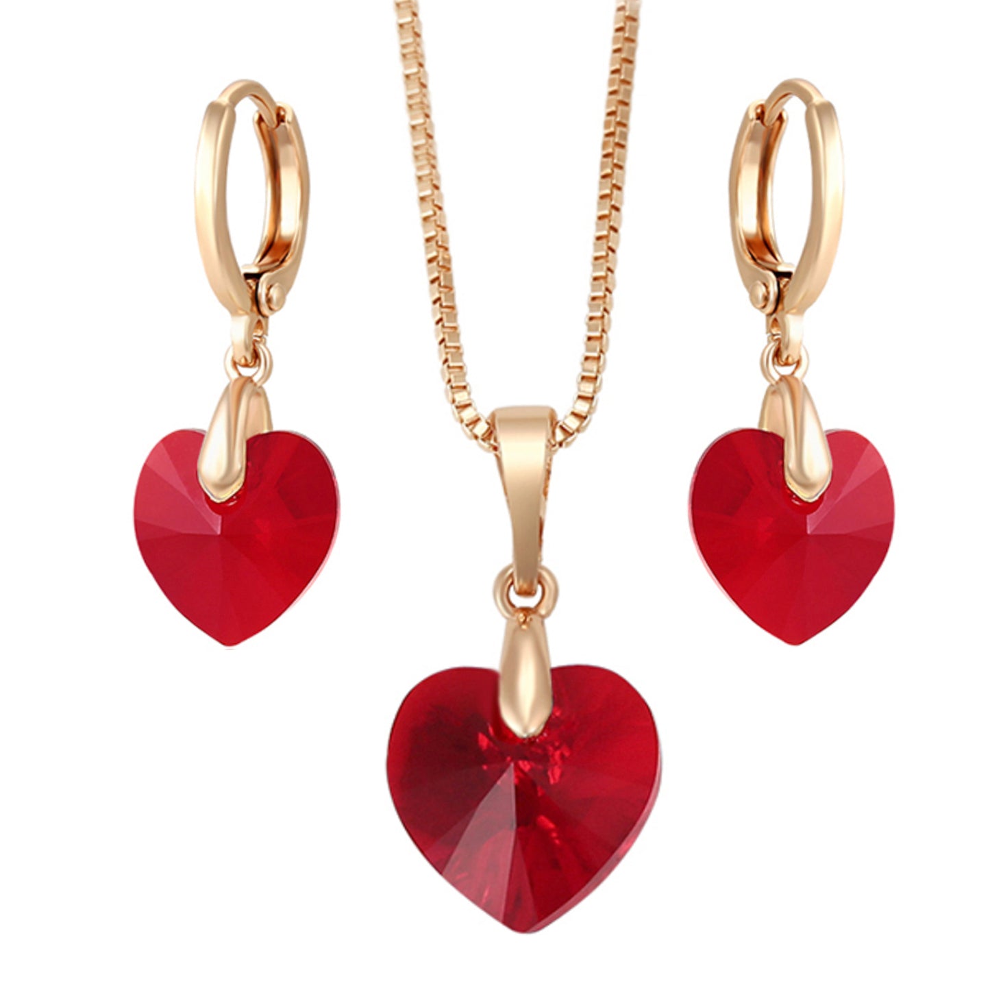 Juego de aretes colgantes con dije corazon cristal en oro laminado