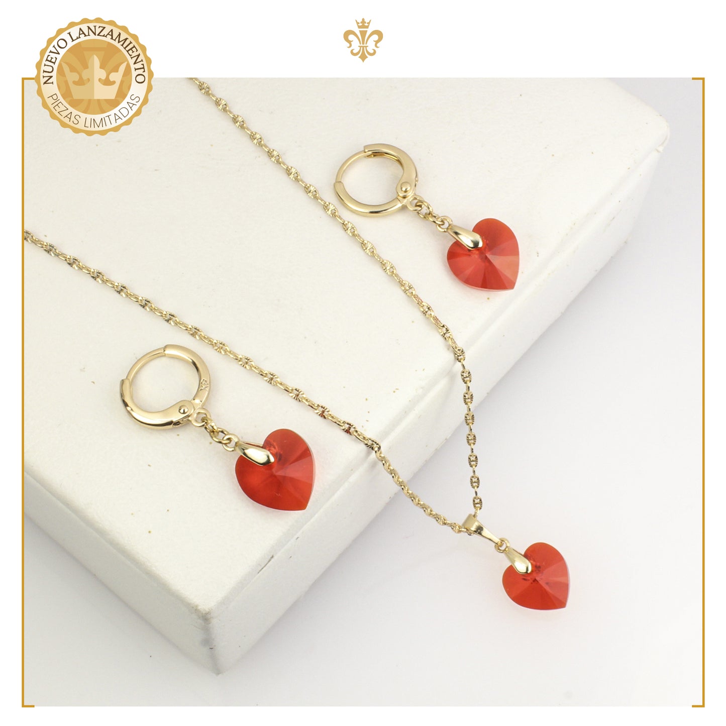 Juego de aretes colgantes con dije corazon cristal en oro laminado